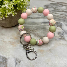 Load image into Gallery viewer, Silicone Bracelet Keychain - Light Green Pink Floral
