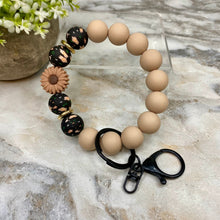 Load image into Gallery viewer, Silicone Bracelet Keychain - Dark Tan Sunflower Black Floral
