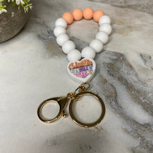 Load image into Gallery viewer, Silicone Bracelet Keychain - Teach - Orange Cream
