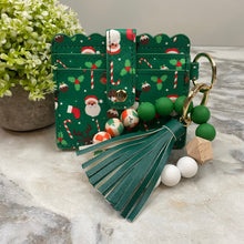 Load image into Gallery viewer, Silicone Bracelet Keychain with Scalloped Card Holder - Christmas - Green Holly Candy Cane
