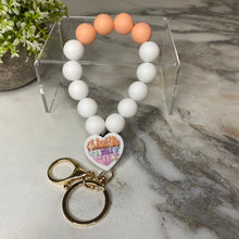 Load image into Gallery viewer, Silicone Bracelet Keychain - Teach - Orange Cream
