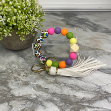 Load image into Gallery viewer, Silicone Bracelet Keychain - Rainbow Animal Print
