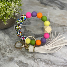 Load image into Gallery viewer, Silicone Bracelet Keychain - Rainbow Animal Print
