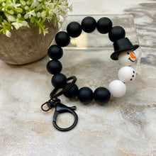 Load image into Gallery viewer, Silicone Bracelet Keychain with Tassel - Christmas - Black Hat Snowman
