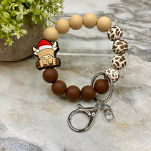 Load image into Gallery viewer, Silicone Bracelet Keychain -  Christmas Beige Highland Cow
