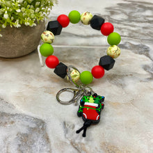 Load image into Gallery viewer, Silicone Bracelet Keychain - Christmas Winter - Green Red Black Stocking
