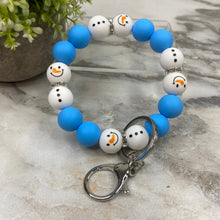 Load image into Gallery viewer, Silicone Bracelet Keychain - Christmas Winter - Blue White Snowman
