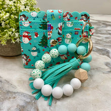 Load image into Gallery viewer, Silicone Bracelet Keychain with Scalloped Card Holder - Christmas - Turquoise Snowman
