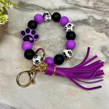 Load image into Gallery viewer, Wood &amp; Silicone Bracelet Keychain - Purple Paw Print
