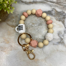 Load image into Gallery viewer, Silicone Bracelet Keychain - Coffee Teach Repeat Cream Blush
