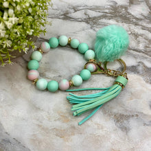 Load image into Gallery viewer, Silicone Bracelet Keychain - Tassel &amp; Pom Pom- Mint &amp; Sherbet
