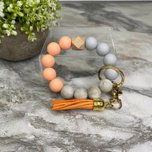 Load image into Gallery viewer, Silicone Bracelet Keychain - Creamsicle
