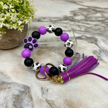 Load image into Gallery viewer, Wood &amp; Silicone Bracelet Keychain - Purple Paw Print
