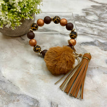 Load image into Gallery viewer, Silicone Bracelet Keychain - Tassel &amp; Pom Pom- Brown &amp; Animal Print
