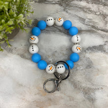 Load image into Gallery viewer, Silicone Bracelet Keychain - Christmas Winter - Blue White Snowman
