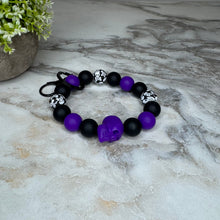 Load image into Gallery viewer, Silicone Bracelet Keychain - Halloween Skull - Purple
