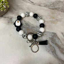 Load image into Gallery viewer, Silicone Bracelet Keychain - Penguin Black &amp; White
