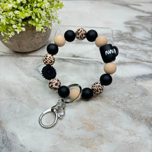 Load image into Gallery viewer, Silicone Bracelet Keychain - Black Sunflower Mama Mug
