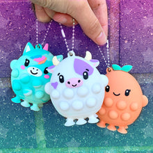 Load image into Gallery viewer, OMG Pop Rockers Keychain Toy
