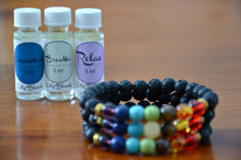 Load image into Gallery viewer, Multi-Colored Lava Stone Diffuser Bracelets - Oily BlendsMulti-Colored Lava Stone Diffuser Bracelets
